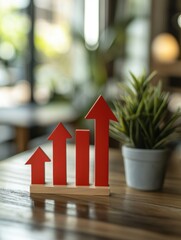 Upward Trend Presentation with Red Arrows on Wooden Table in Business Environment Setting