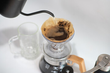 Coffee drip equipment with coffee bean on white background