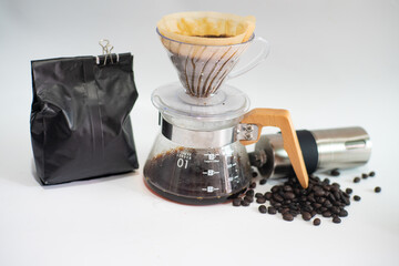 Coffee drip equipment with coffee bean on white background