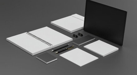 Blank stationery set with black and white branding elements on a gray surface. Organized collection of notebooks, envelopes, business cards, and a tablet.