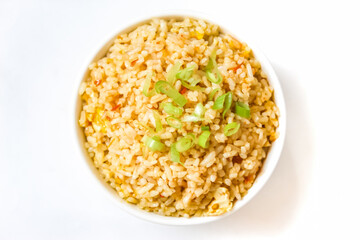 a bowl of fried rice isolated on a white background