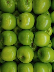 Fresh Shiny green apple (Malus domestica) pile for background