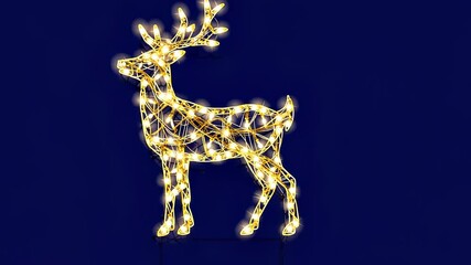 Deer is lit up with lights and is standing on a blue background. The deer is lit up and he is in a festive mood - Powered by Adobe