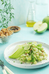 A plate with Waldorf salad, traditional American	