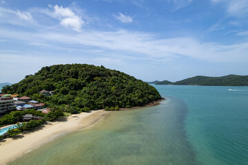 Fototapeta premium Aerial view of a blue sea surface water texture background and sun reflections Aerial flying drone view Waves water surface texture on sunny tropical ocean in Phuket island Thailand