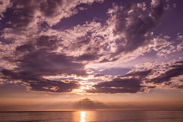 Aerial view sunset sky,Nature beautiful light sunset or sunrise over sea surface,Colorful sunset sky with clouds and waves in the ocean,Wide angle sea background