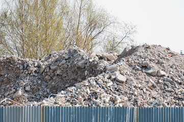 a mountain of construction waste stone and rubble