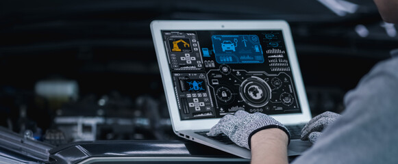 Close-up of a car diagnostic system in use, as a skilled mechanic carefully inspects engine data to provide precise maintenance and reliable repair services in a professional auto repair garage
