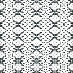 Patterned wallpaper with repeating circles and other elements and symmetry.
