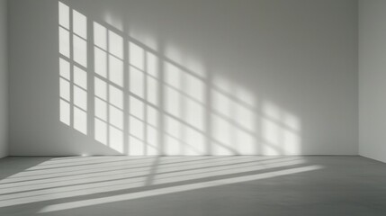 Obraz premium A minimalist white room with a large window and long shadows.