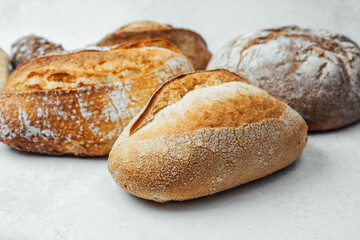 Assorted artisan bread loaves freshly baked and ready to enjoy
