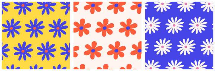 Trendy seamless floral pattern set with colorful hand drawn daisies in retro style. Bright summer design for fabric, wrapping paper, wallpaper, textile, and surface decoration.