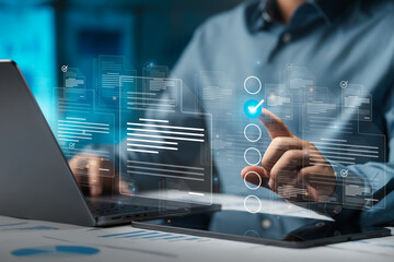 Businessman doing online survey to fill out digital document form for business performance review,...