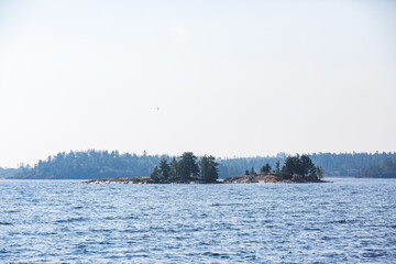 Small rock islands next to the Koyonsaari Island. Skerries of Ladoga Lake. Karelia landscape, Russia