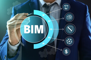 Building information modeling. Man using virtual screen with abbreviation BIM and different icons,...