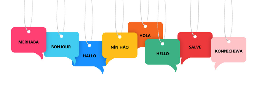 Paper speech bubbles with greetings in different languages hanging on white background. Banner design