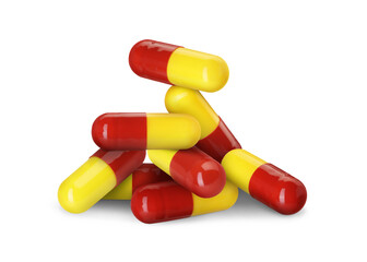Antibiotic pills. Yellow and red capsules on white background