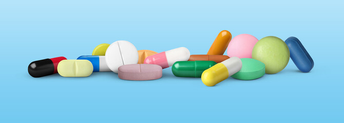 Different antibiotic pills on light blue background. Banner design