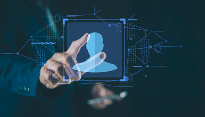 A hand interacts with a digital interface displaying a virtual user profile icon, symbolizing identity and technology.