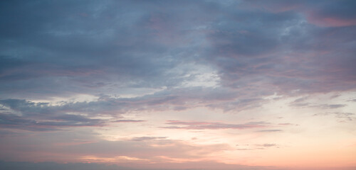 Subtle Sunset Sky: Pastel Clouds