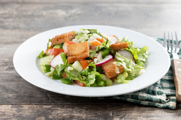 Fattoush salad, Traditional Lebanese Salad on wooden table