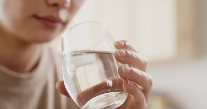 Looking at a glass of water with suspicion