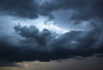 Obraz premium Dark clouds gather before a powerful storm.