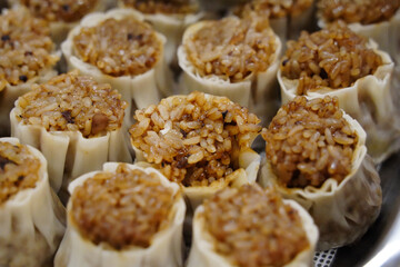 Close-up of Steamed Siu Mai Dumplings with Savory Filling