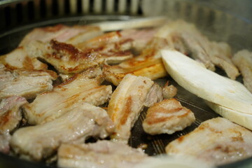 Close-Up of Delicious Korean Barbecue with Samgyeopsal (Pork Belly)