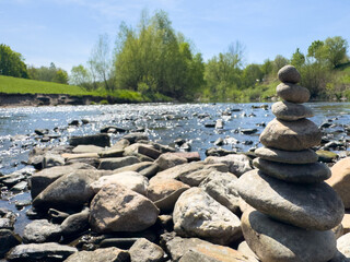 balance stones on the river in the spring zen spa