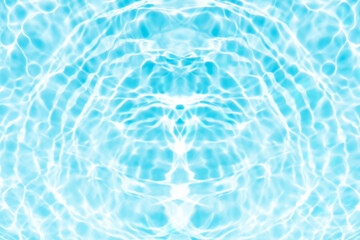Blue water with ripples on the surface. Defocus blurred transparent blue colored clear calm water surface texture with splashes and bubbles. Water waves with shining pattern texture background.