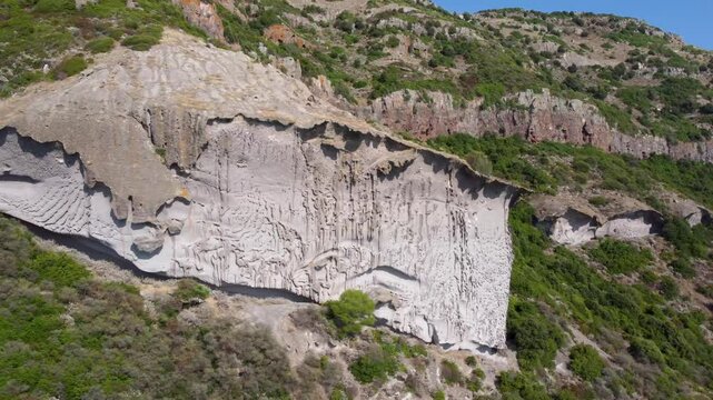 Sa Rocca Pinta, a famous rock wall with unique shapes due to erosion near Villanova Monteleone, on the island of Sardinia. Hiking area belonging to the Grifone nature reserve