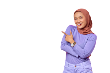 Portrait of smiling young Asian woman pointing finger at copy space isolated on transparent background