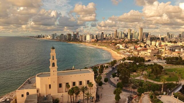 Aerial video of Tel Aviv Jaffa coastline in Israel during daylight 