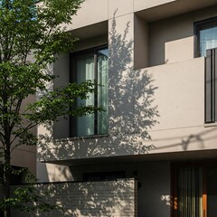 Close-Up of Modern Tokyo Building Facade with Glass and Concrete