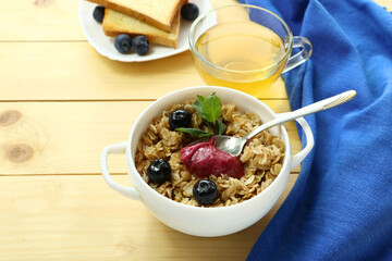 Tasty health breakfast with honey cream