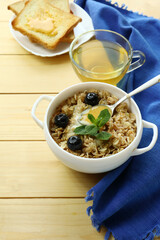 Tasty health breakfast with honey cream