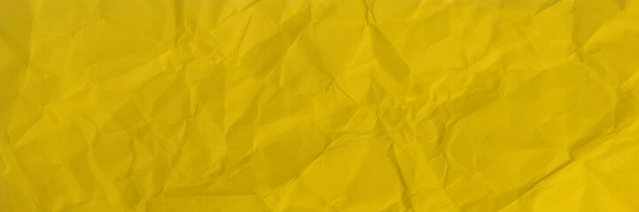 Panorama view Paper texture background, Crumpled paper. yellow creased paper.