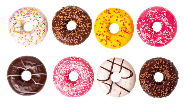Delicious assorted donuts with colorful icing and toppings, including sprinkles, chocolate, and nuts, arranged in visually appealing pattern. Perfect for dessert lovers