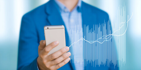 Businessman analyzing financial data on smartphone dashboard