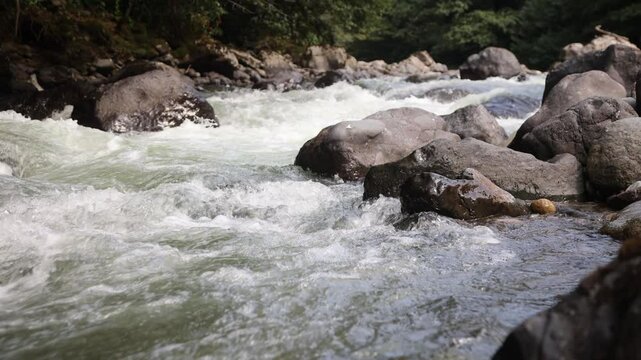 The swift and indomitable flow of a mountain river.