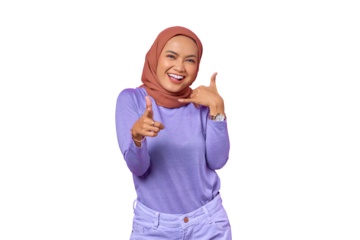 Attractive young Asian woman wink eye pointing to you make call a sign isolated on transparent background