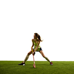 Focused female athlete showcases agility and reaction speed while preparing to strike during...