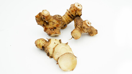Fresh galangal (Alpinia galanga) isolated on a white background