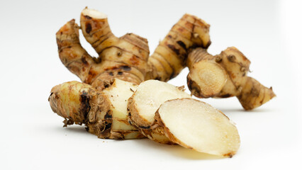 Fresh galangal (Alpinia galanga) isolated on a white background