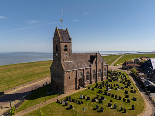 Idyllic Church by the Sea – Aerial View of Wierum, Netherlands