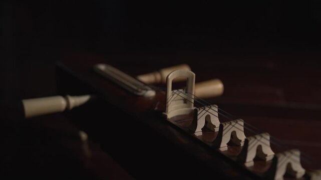 A pack of Thai stringed musical instruments called "Ja-Khay"