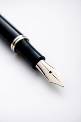 Fototapeta premium Luxury Fountain Pen: Black Writing Instrument with Metal Nib and Silver Accents - Perfect for Professional Writing and Calligraphy
