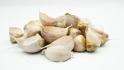 Fresh Peeled Garlic Bulb and Cloves isolated on white background