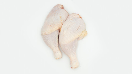 Chicken thighs  on a white background